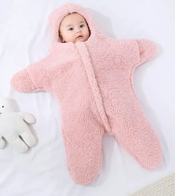 Pink baby quilt by SHOPEZRA L.L.C. featuring soft fabric and cozy design for infants and young children.