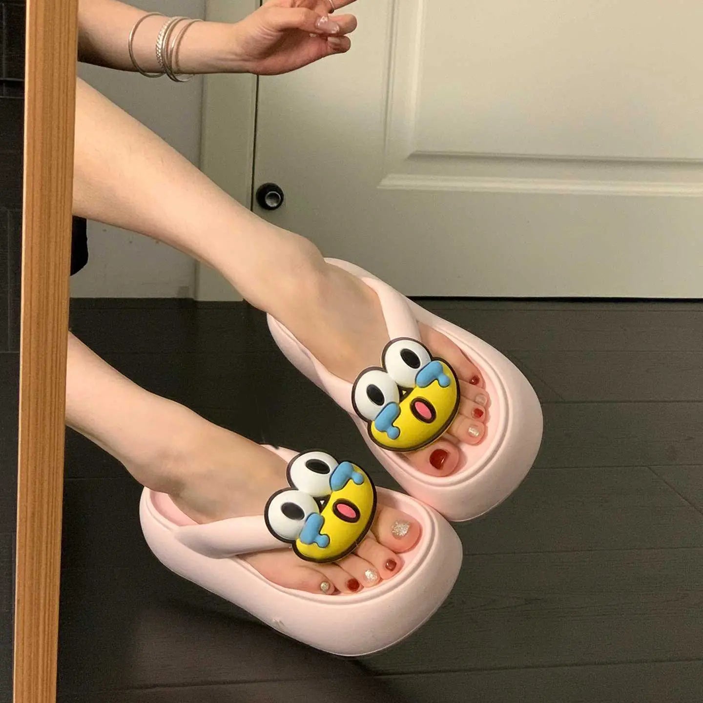 Cute pink cartoon flip-flops for women by SHOPEZRA L.L.C., summer outdoor beach sandals with thick non-slip soles and playful accessories.