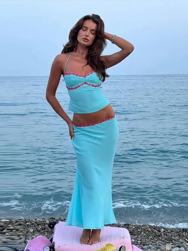 Pink 2-piece skirt set with sequin trim, halter crop top, and maxi skirt, perfect for spring summer night out or party wear.