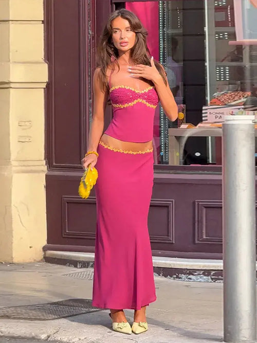 Pink 2-piece skirt set with sequin trim, halter crop top, and maxi skirt, ideal for spring summer night outs and parties.