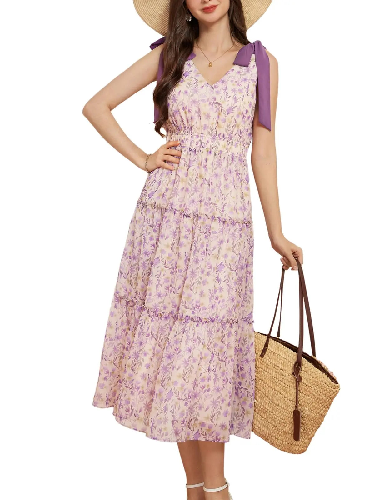 Floral summer vacation dress featuring a V-neck, sleeveless design, and bow tie shoulders in purple hues.