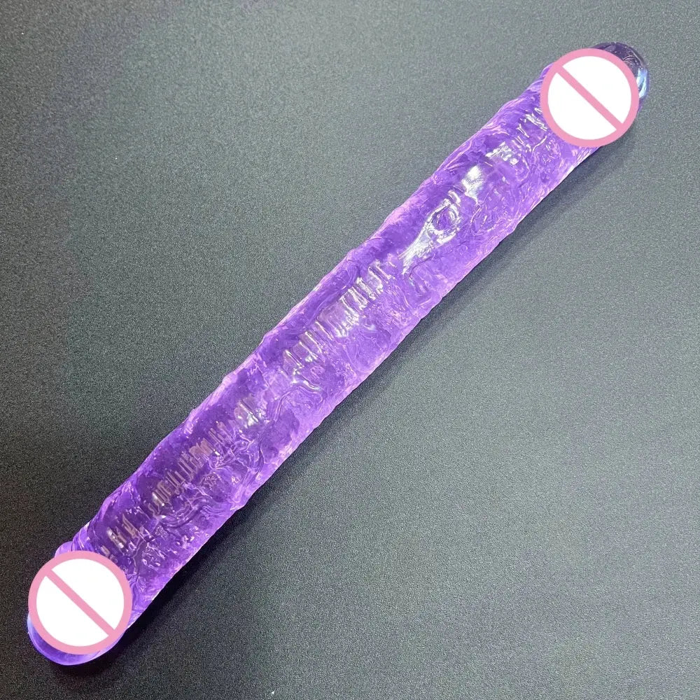 Purple double dildo with realistic penis design, accompanied by a bullet vibrator, for lesbian couples and adult sex play.