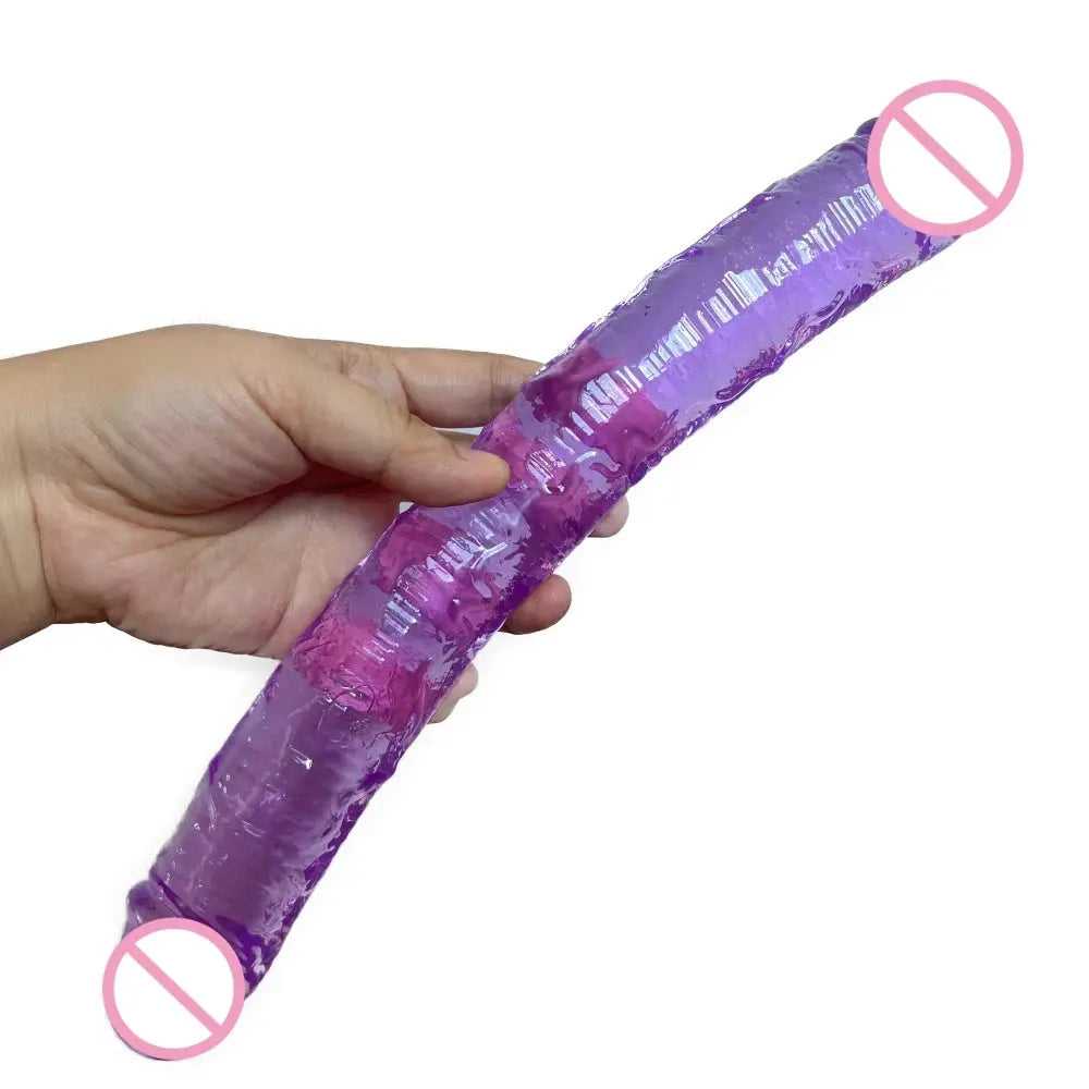 Purple double dildo with realistic penis design, accompanied by a bullet vibrator, ideal for adult female anal and vaginal play.