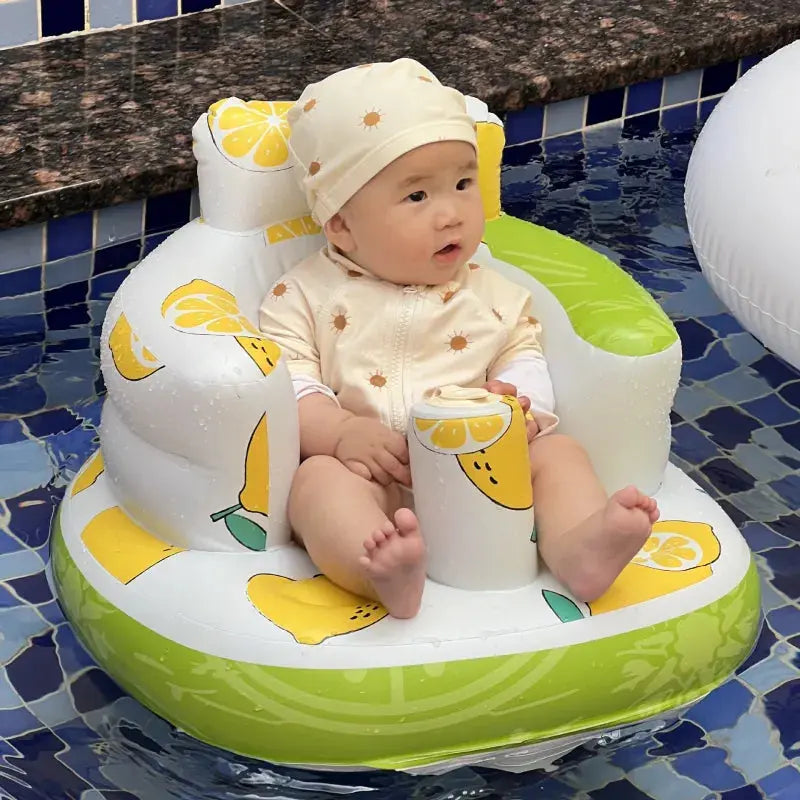 Inflatable baby chair for dining and bath by SHOPEZRA L.L.C., featuring a colorful rainbow design and soft, cushioned seating.