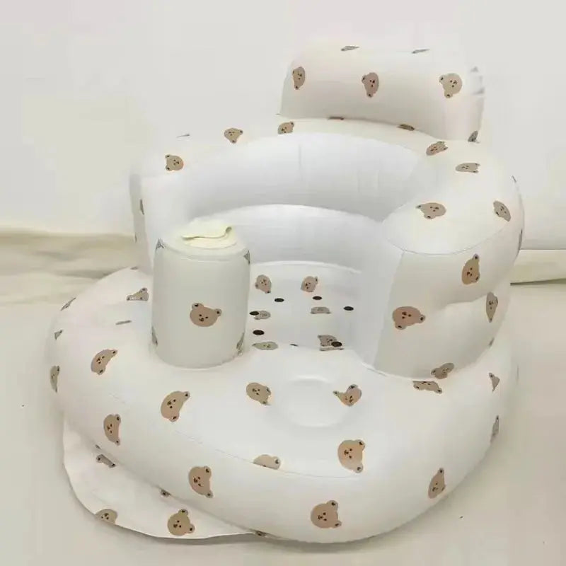 Inflatable baby chair in rainbow colors by SHOPEZRA L.L.C. designed for dining and bath use, featuring a soft, supportive seat for infants.