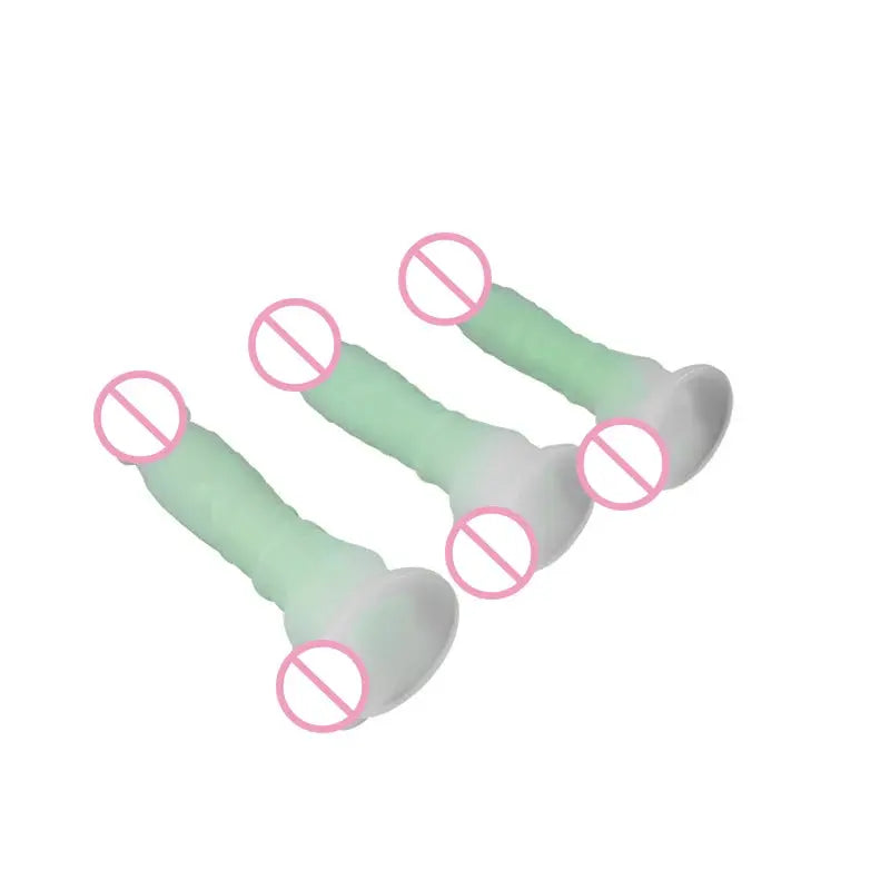 Three sizes of luminous silicone realistic glow-in-the-dark dildo with strap-on for adult women, featuring detailed penis design.
