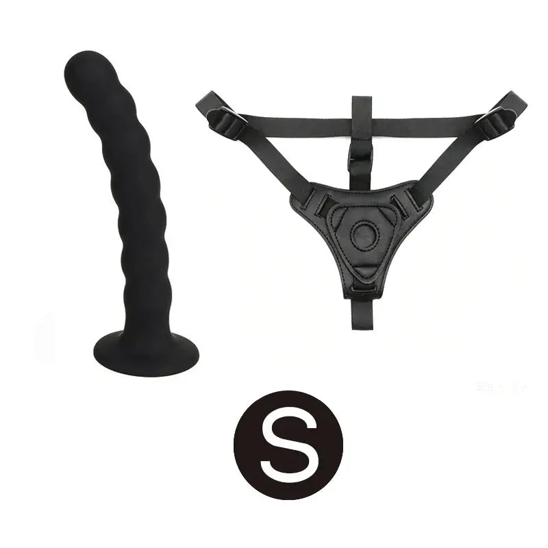 Realistic wearable dildo sex toy for women, featuring strap-on, suction cup, and anal plug, designed for lesbian women and couples.