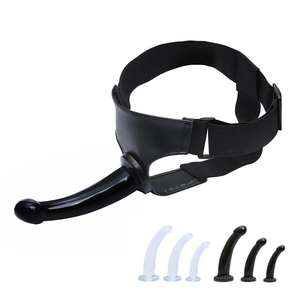 Black realistic dildo with suction cup, jelly material, designed for women, with a strap-on harness and large penis shape.