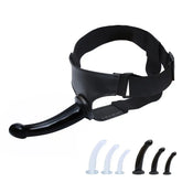 Black realistic dildo with suction cup, jelly material, designed for women, with a strap-on harness and large penis shape.
