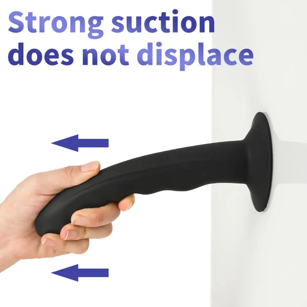 Silicone dildo with suction cup, designed as a large penis and prostate massager for female pleasure and anal stimulation.