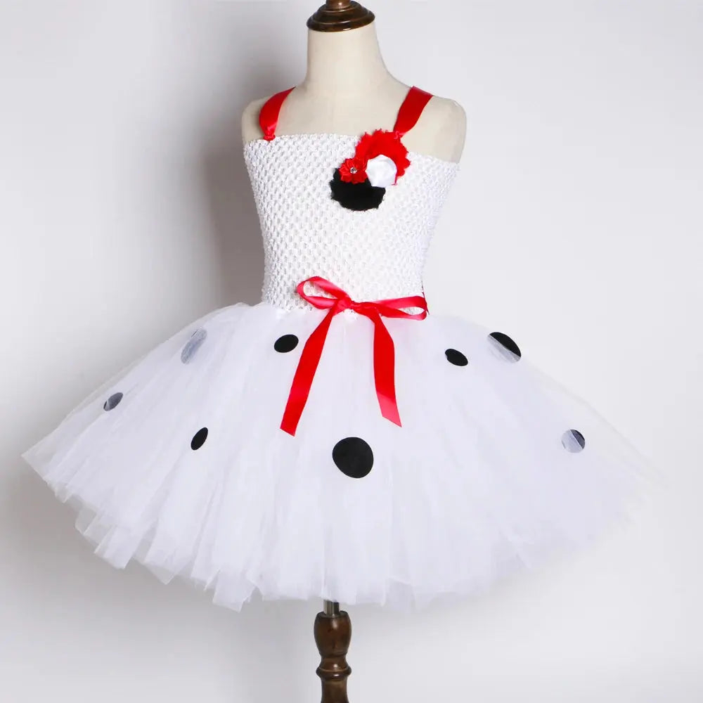 Kids Dalmatian costume by SHOPEZRA L.L.C. featuring a spotted dog tutu dress with flowers, suitable for Halloween and parties.