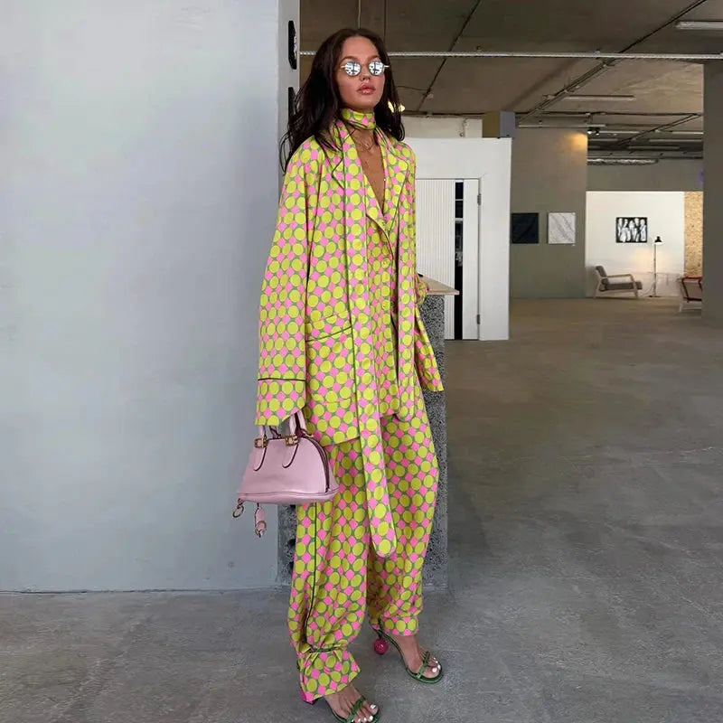Casual plaid women's blazer and wide-leg trousers set with long sleeves, scarf collar, and button shirt, summer 2026 fashion.