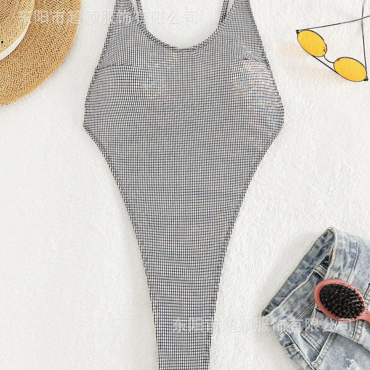 Silver backless thong one-piece swimsuit by SHOPEZRA L.L.C., featuring bright surface design and sexy European-American style.