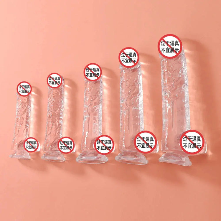 Mini clear silicone dildo by SHOPEZRA L.L.C., small, transparent, flexible adult toy with realistic design.