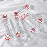 Mini clear silicone dildo from SHOPEZRA L.L.C., showing a small, smooth, transparent adult toy on a white background.