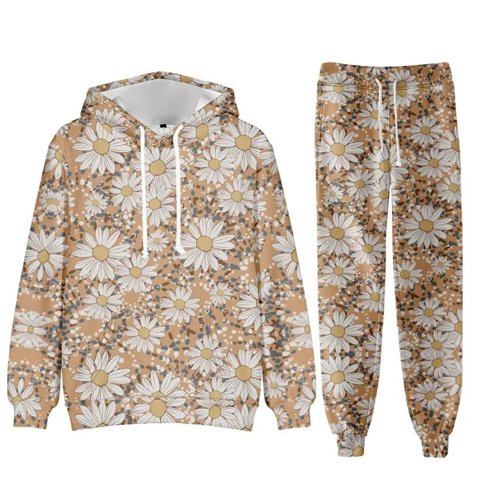 Chic floral women's tracksuit set with oversized hoodie and jogger sweatpants, stylish and comfortable for sports or lounging.