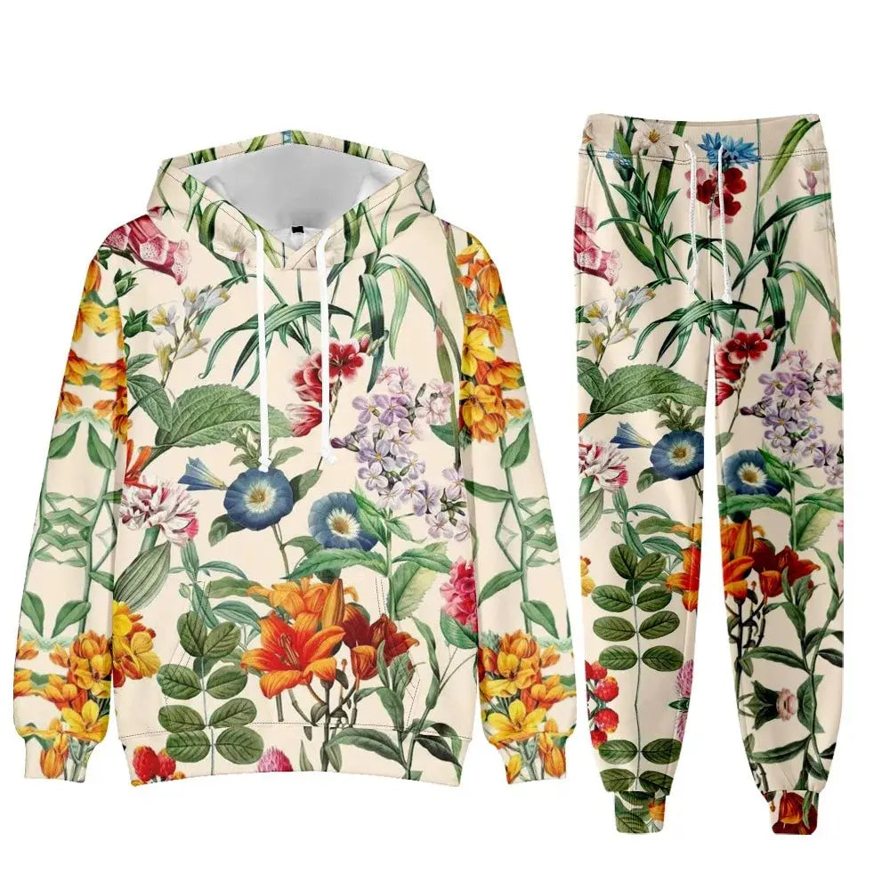 Elegant floral women's tracksuit set with oversized hoodie and jogger sweatpants, featuring chic floral patterns and comfortable fit.