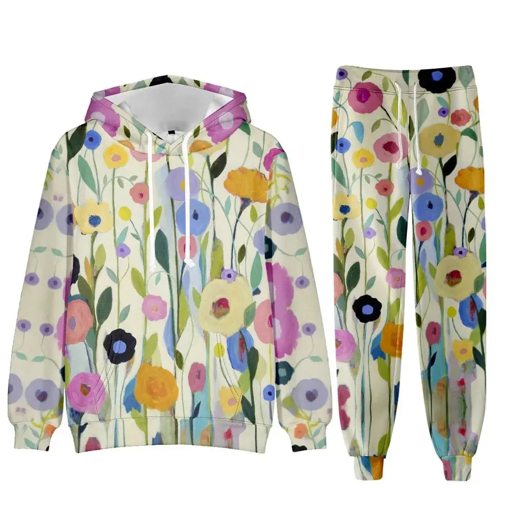 Chic floral women's tracksuit set with oversized hoodie and jogger sweatpants, stylish and comfortable for sports or lounging.
