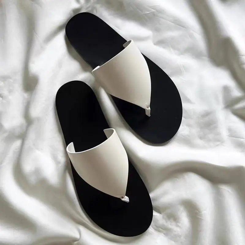 White SHOPEZRA L.L.C. women's flat thong sandals with outdoor wear design, perfect for summer beach and casual outdoor outings.