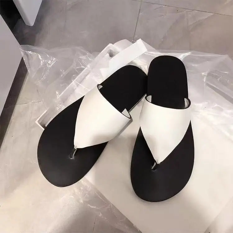 White SHOPEZRA L.L.C. flat thong women's Roman sandals for outdoor summer wear, beach shoes, and casual outdoor footwear.