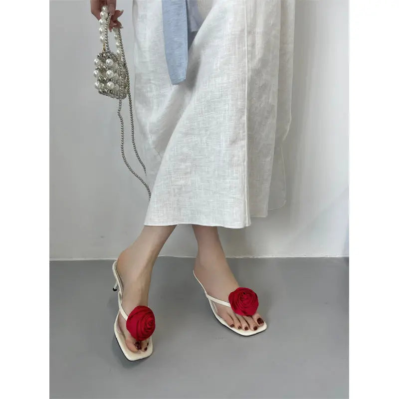 White floral high heels featuring stiletto thong sandals and slippers, stylish summer footwear by SHOPEZRA L.L.C.
