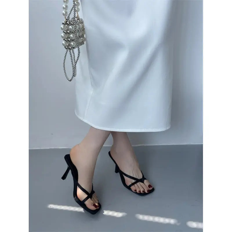 White European and American fashion high heel thong sandals for women, featuring a fine, elegant heel design