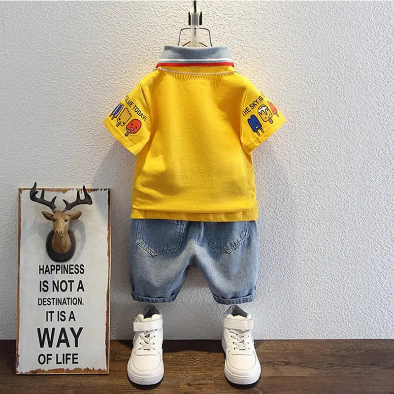 Kids boys summer outfit with short sleeve cartoon print lapel T-shirt and denim shorts, 2-piece tracksuit set by SHOPEZRA L.L.C.
