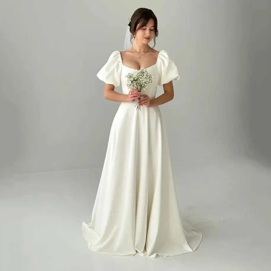 White ivory customized wedding dress with sleeves, fairy tale style, elegant one-line design, by SHOPEZRA L.L.C.