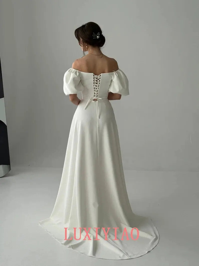 White ivory customized Dignified dress with sleeves, fairy tale style, one-line wedding dress by SHOPEZRA L.L.C.