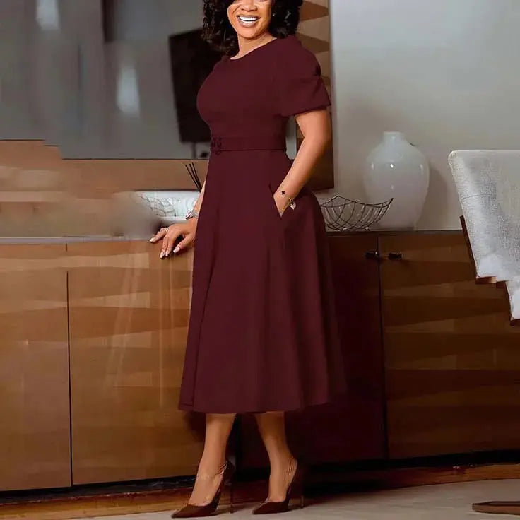 Elegant white women's office dress with O-neck, short sleeves, belt, A-line silhouette, mid-calf length, suitable for formal business wear.