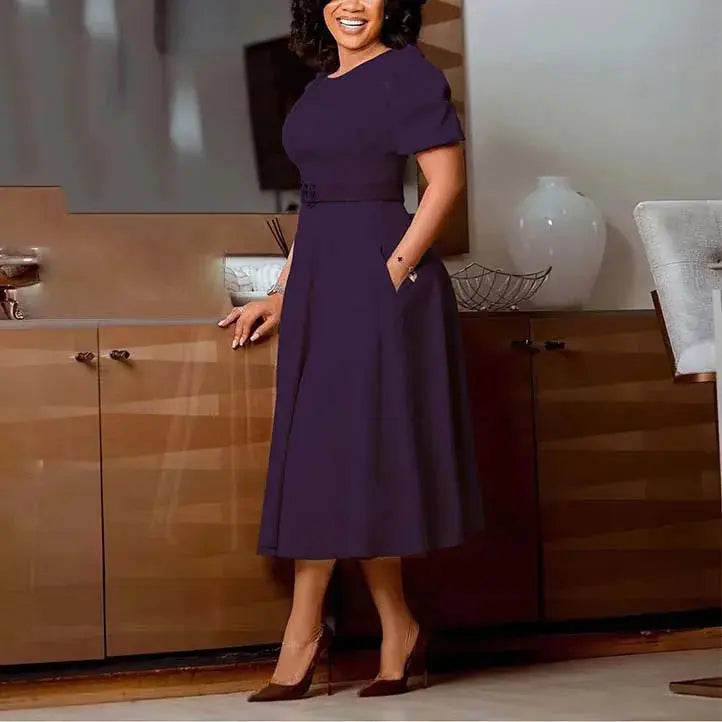 Elegant white office dress for women with O-neck, short sleeves, belt, and A-line mid-calf length, suitable for professional work.