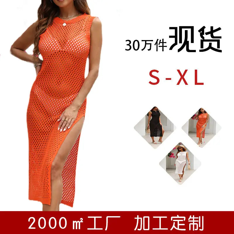 White knitted European and American style beach dress with hollow design, perfect as a sexy bikini cover-up or vacation blouse.