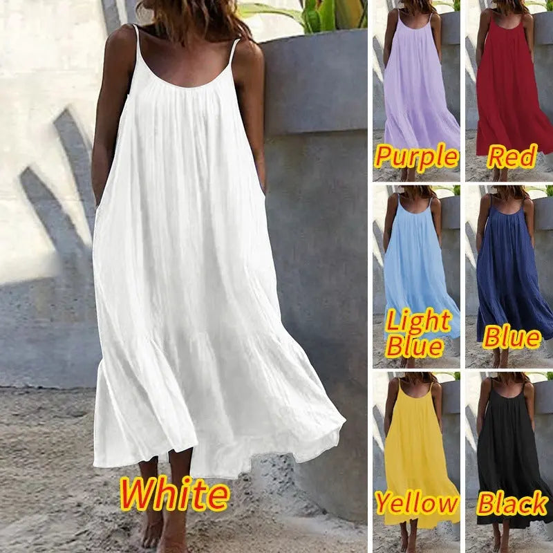 White sleeveless long summer dress with ruffled solid color design, thin shoulder straps, and a loose fit by SHOPEZRA L.L.C.