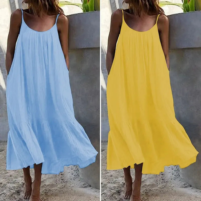 White sleeveless ruffled long summer dress with thin shoulder straps from SHOPEZRA L.L.C., European and American style, loose fit.