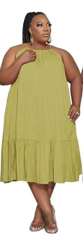 White sleeveless ruffled long summer dress with thin shoulder straps, loose fit, perfect for European and American summer fashion.