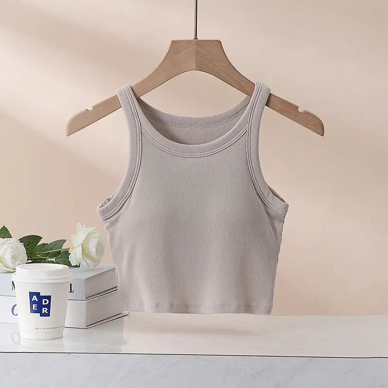 Shopezra L.L.C. women's white I-shaped sports yoga vest with back design, chest pad, and outer wear-free underwear style.