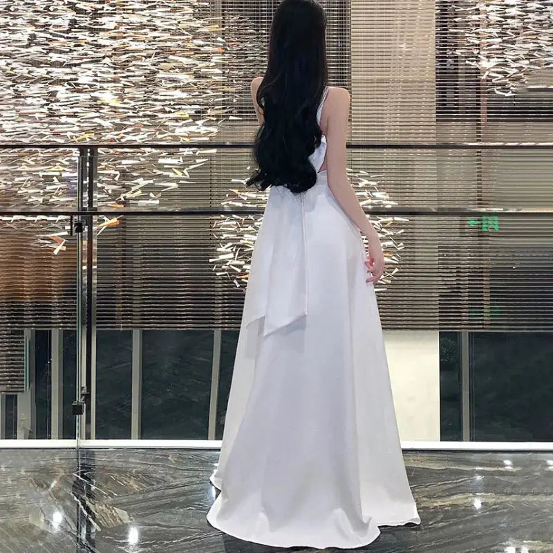 White chic evening dress by SHOPEZRA L.L.C. featuring a long sling design, perfect for elegant banquets, travel, and summer events.