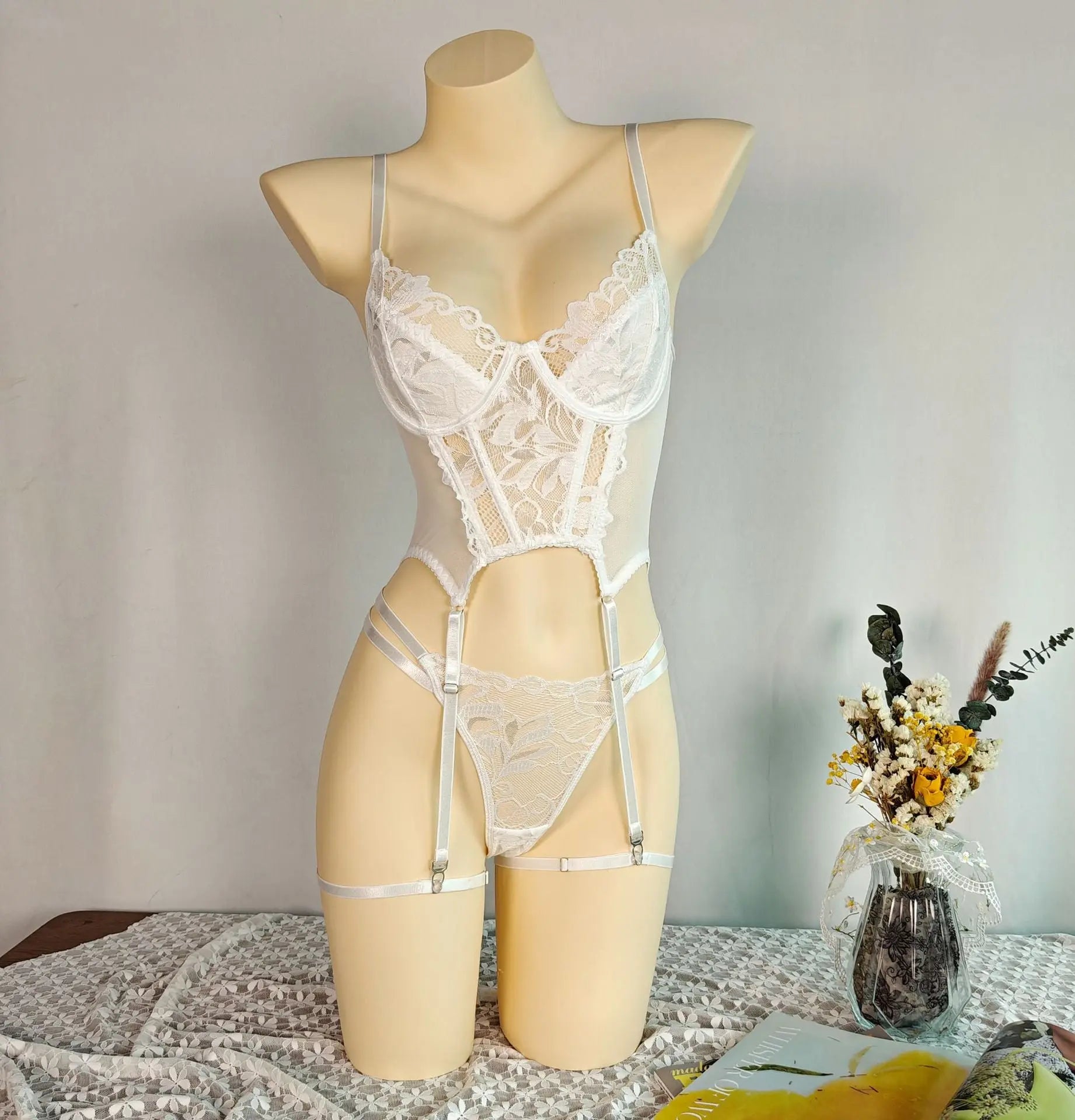 European and American sexy lingerie suit by SHOPEZRA L.L.C., featuring gauze fabric, embroidery, and a flirtatious thong design.
