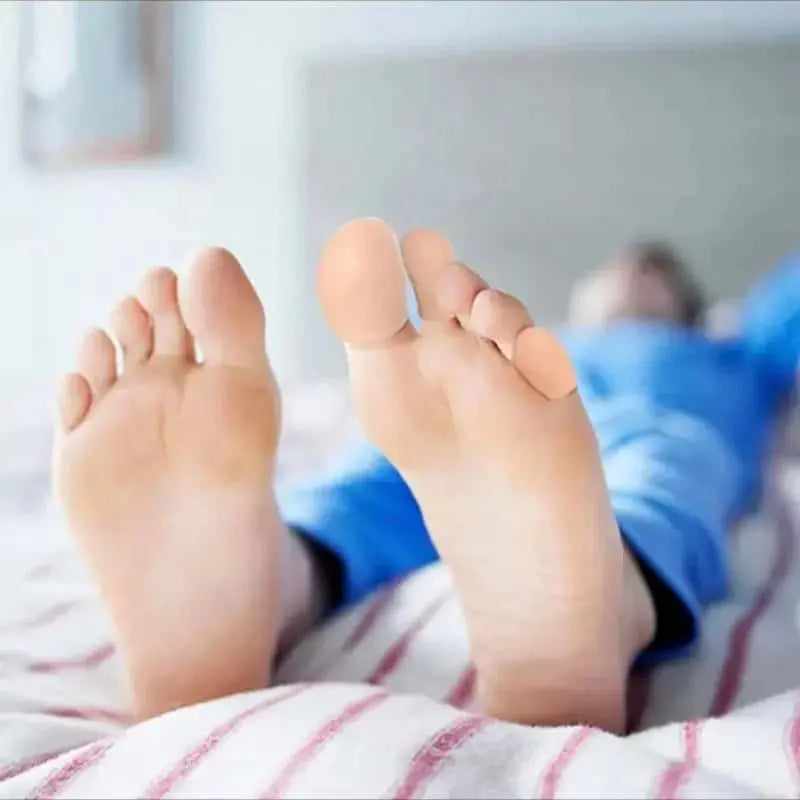 Pair of breathable silicone toe caps for big toes, reducing calluses and blisters, with a slip-on design for comfort and durability.