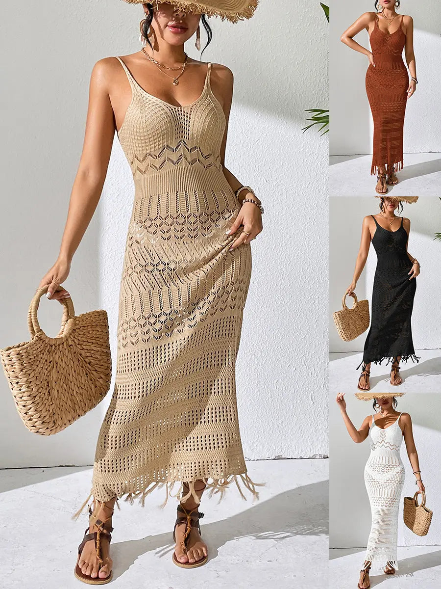 White sleeveless long dress by SHOPEZRA L.L.C. featuring a slim-fit, hollow strap, tassel details, V-neck, and knitted fabric.