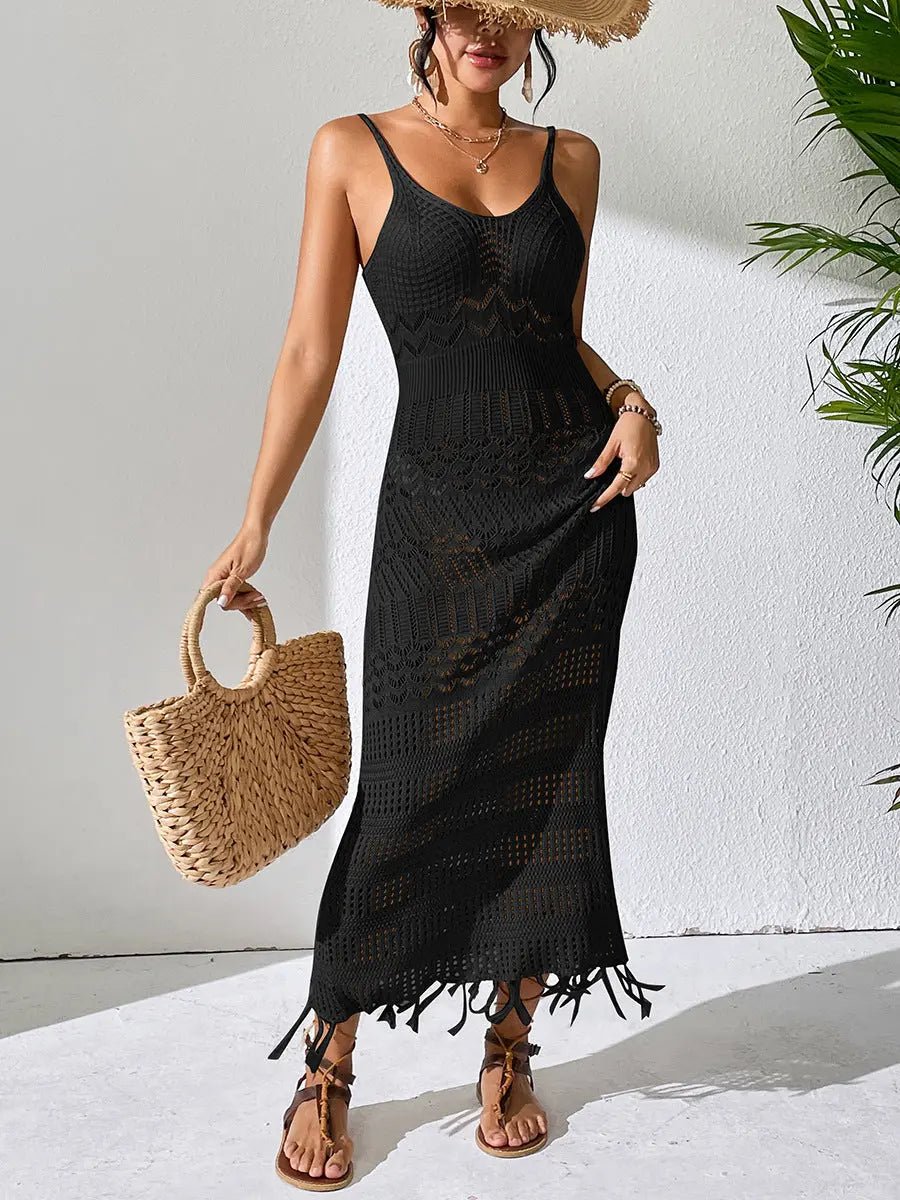 White sleeveless strap beach dress by SHOPEZRA L.L.C., slim-fit, hollow design with tassel details and V-neck for stylish beachwear.