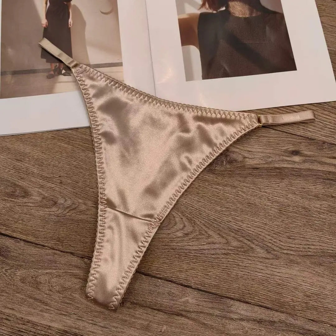White leopard print satin women's thong by SHOPEZRA L.L.C., seamless, low waist, breathable cotton crotch, sexy and comfortable.