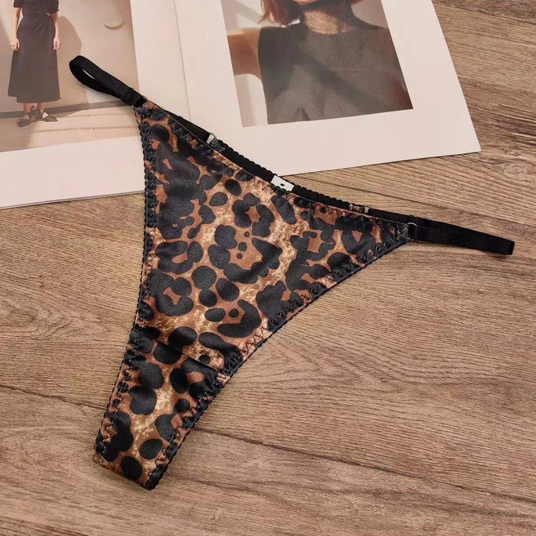 Sexy leopard print satin women's thong by SHOPEZRA L.L.C., seamless, breathable low waist underwear with cotton crotch.