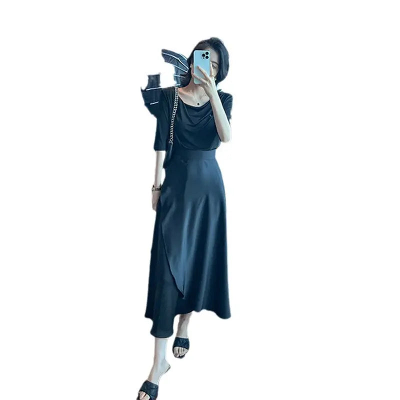 Elegant white two-piece summer set with slim shoulder T-shirt and umbrella skirt, featuring double splits, from SHOPEZRA L.L.C.