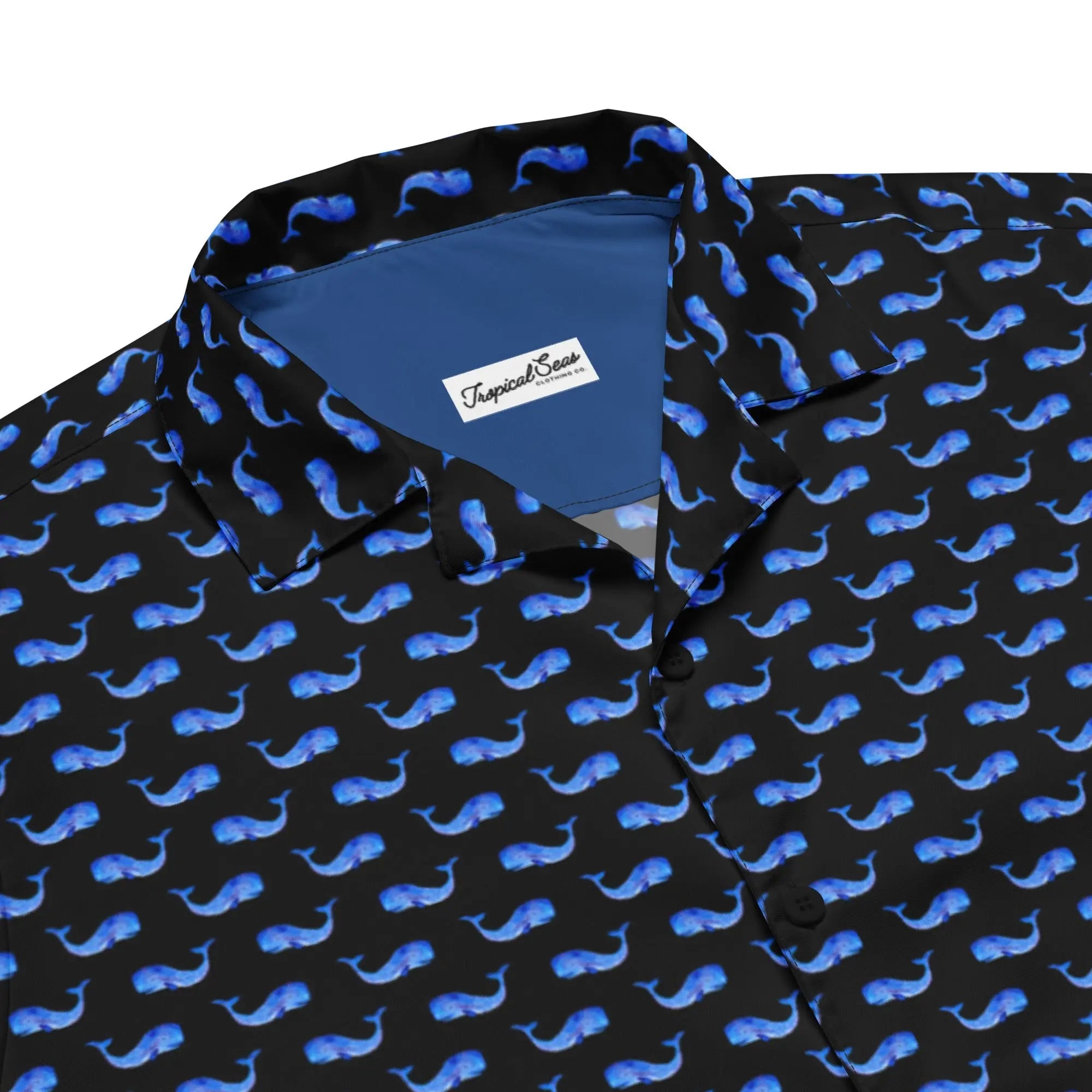 Midnight Whale Hawaiian Shirt featuring a black background with pastel blue whale patterns from the Coastal Summer 2024 Collection.