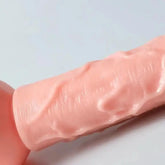 Realistic dildo sex toy for women with skin-like texture, large size, suction cup base, and anal play design by SHOPEZRA L.L.C.