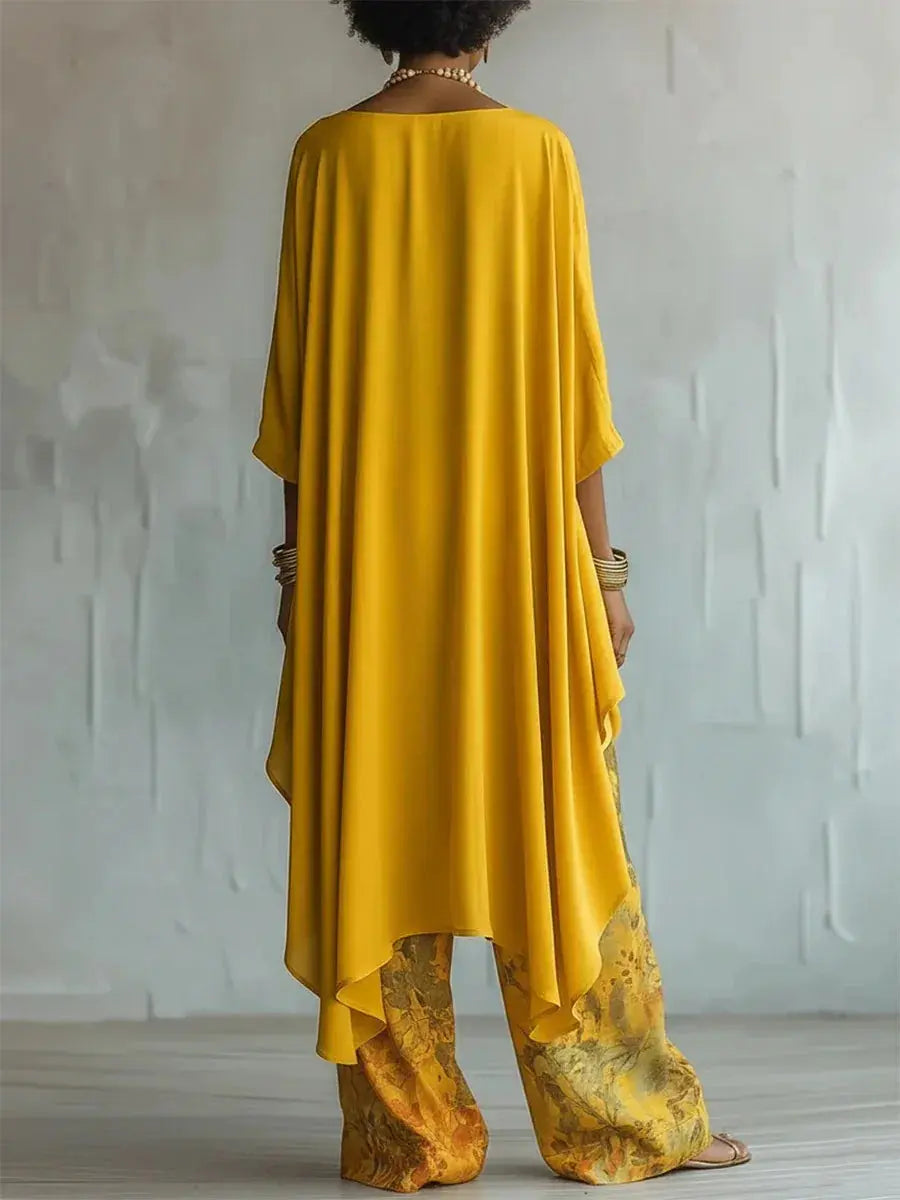 Yellow casual two-piece set with loose O-neck top and printed wide-leg pants, perfect for commuting and relaxed fashion.