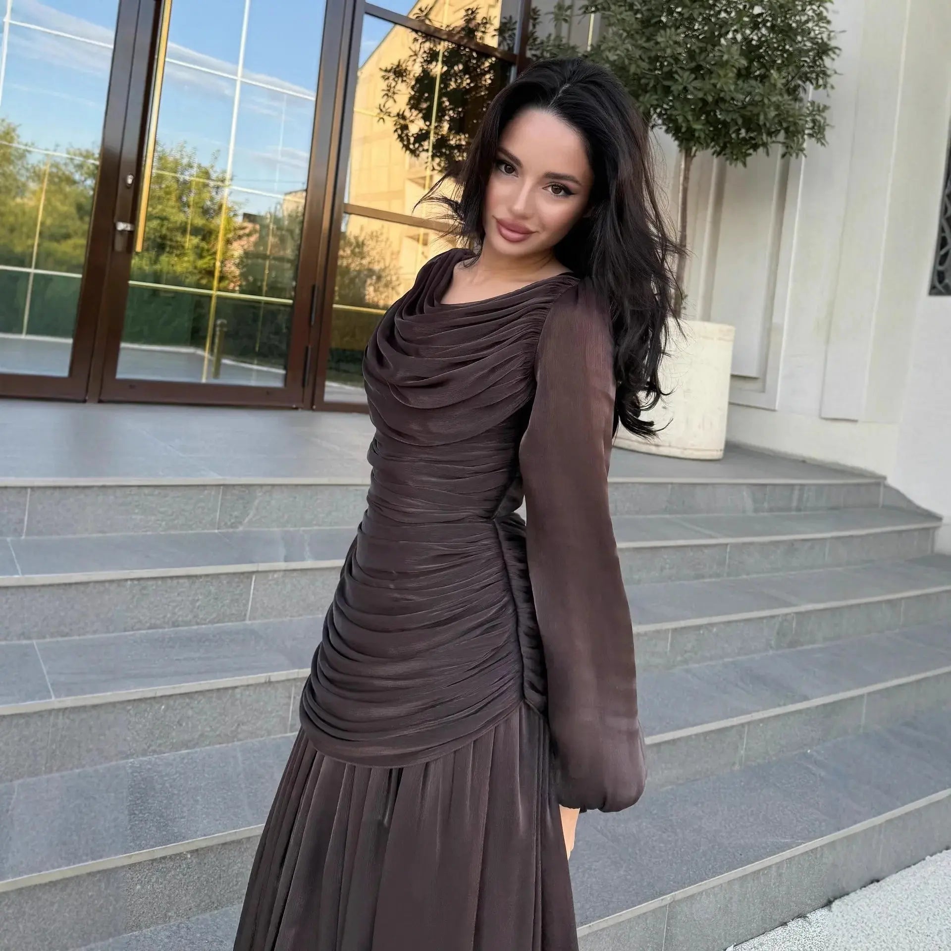 Yellow women's Muslim Eid abaya dress with folds, maxi gown style, long robe, suitable for Ramadan and festive occasions.