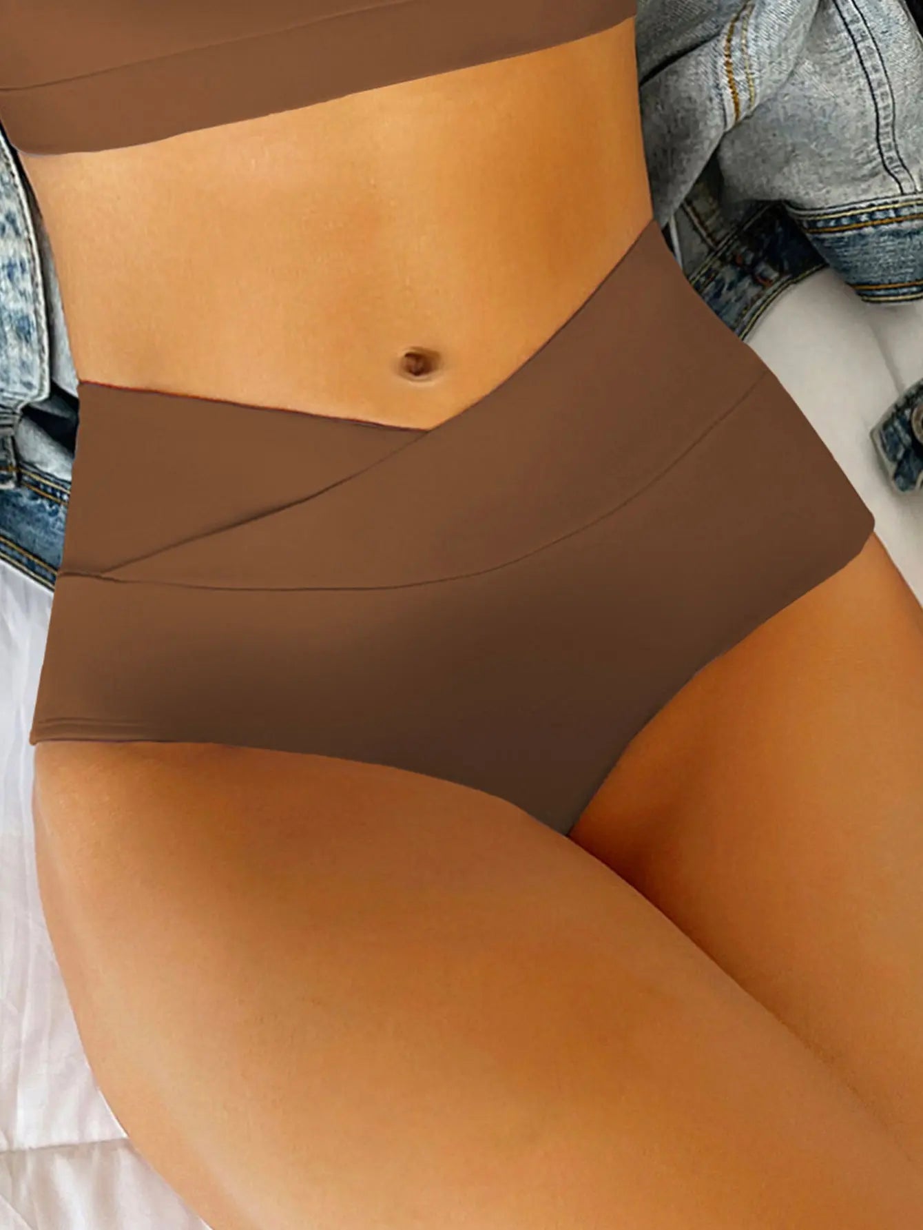 Women's solid color quick-dry bikini swim shorts from SHOPEZRA L.L.C., featuring a sexy design and comfortable fit for beachwear.