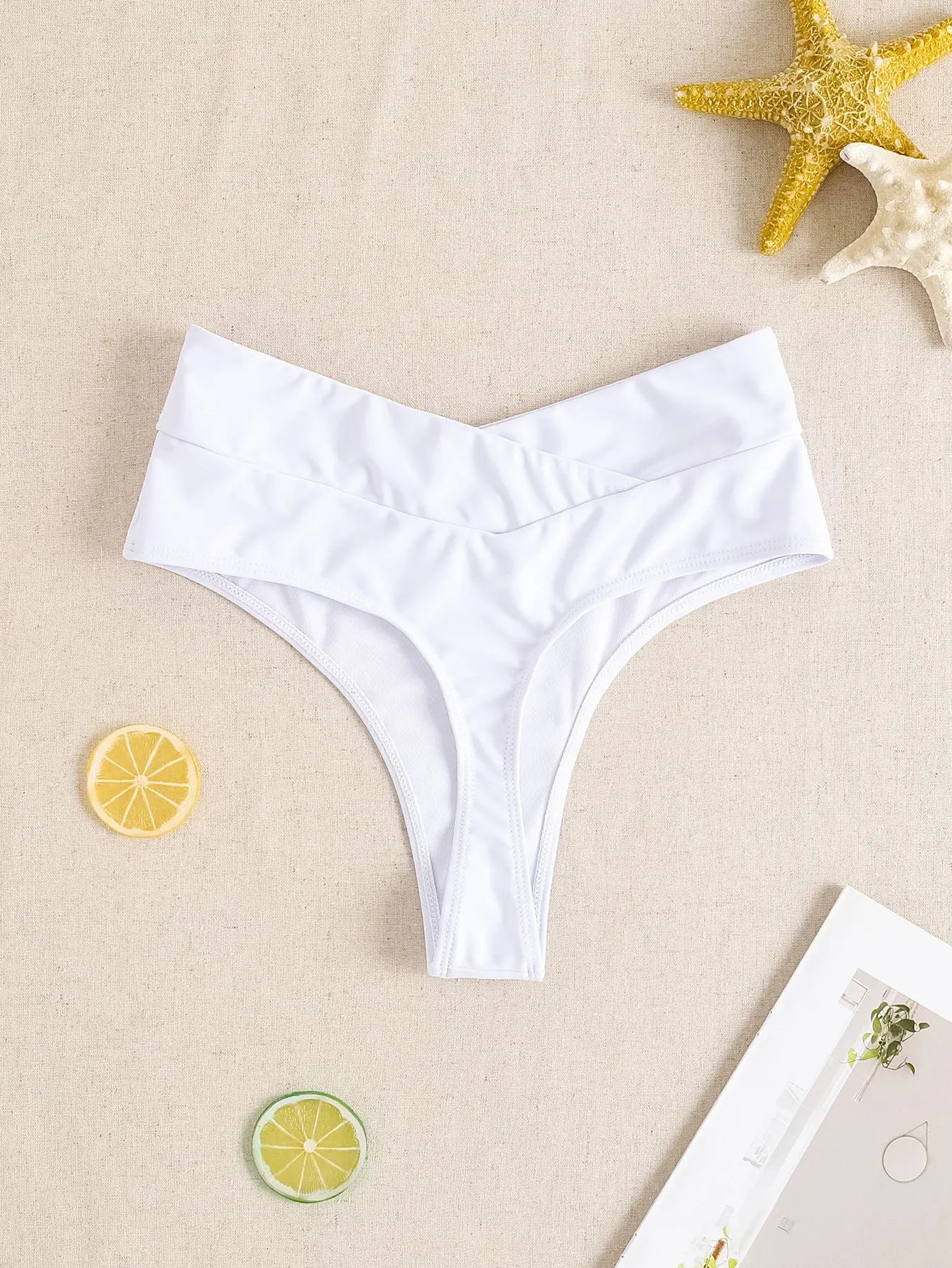 Solid color quick-dry women's bikini swim shorts by SHOPEZRA L.L.C., featuring a sexy, stylish design for beachwear and swimming.